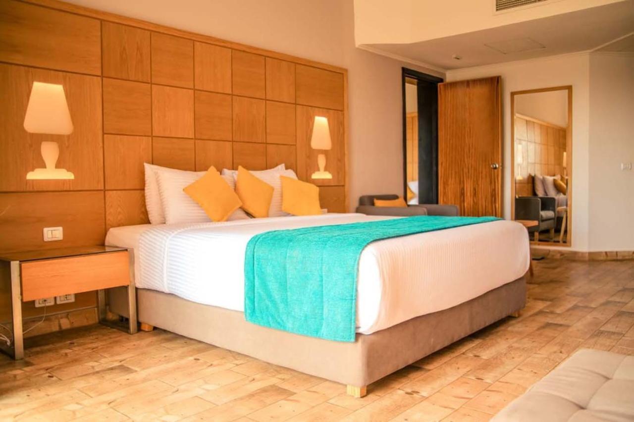 Prima Life Makadi Hotel Hurghada Bagian luar foto A bedroom at the hotel