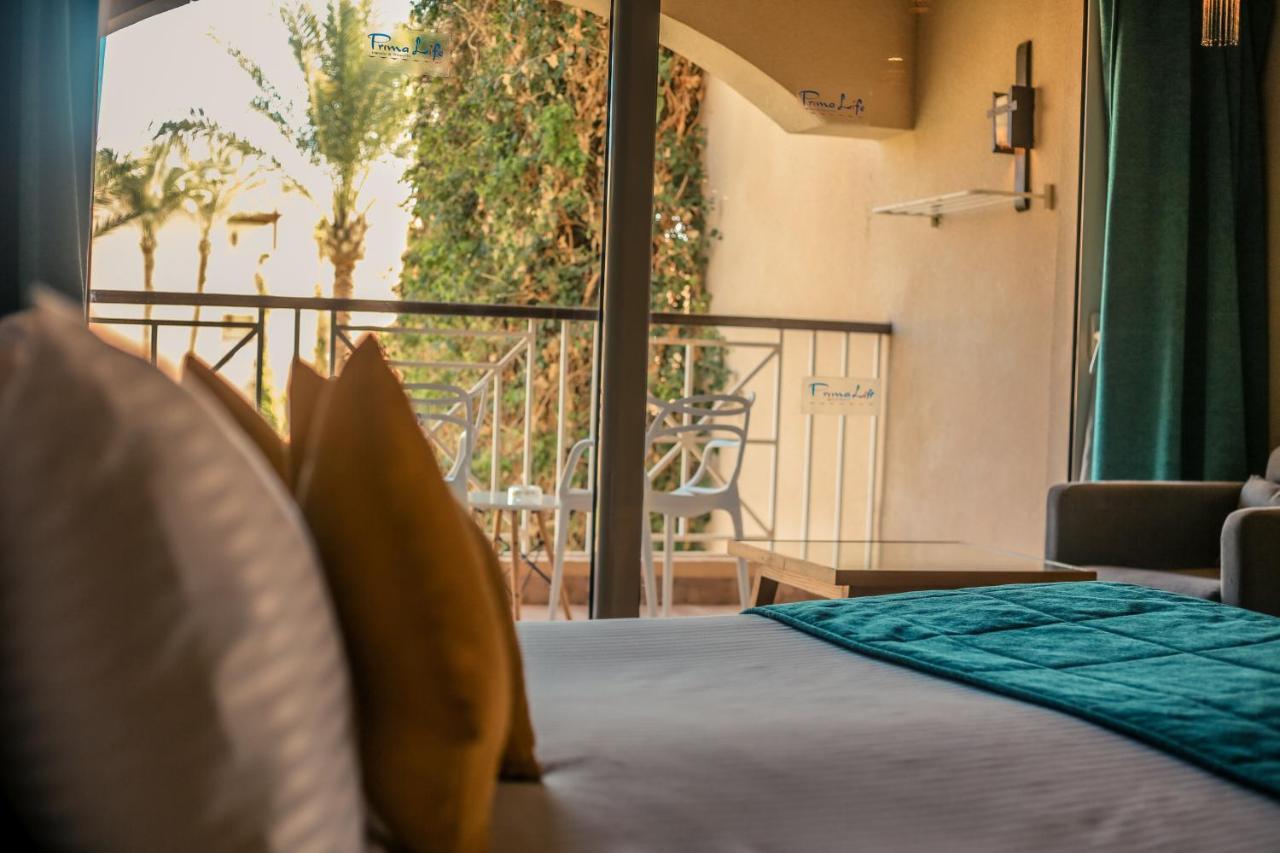 Prima Life Makadi Hotel Hurghada Bagian luar foto A room at the hotel